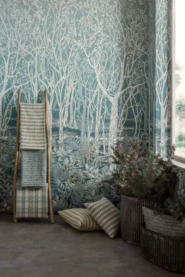 Interior featuring Osborne & Little wallpaper with coordinating furnishings