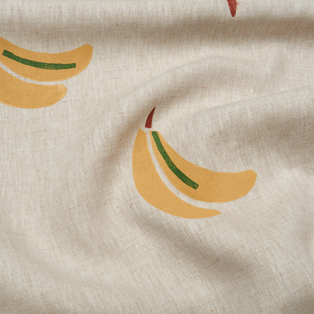 BANANA-STAND-HAND-BLOCK-PRINT-OCHRE-AND-GREEN-ON-NATURAL-SCHUMACHER-182370 - Schumacher Fabric