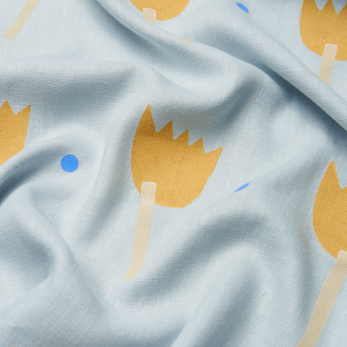 TULIP-PLAY-HAND-BLOCK-PRINT-OCHRE-ON-SKY-SCHUMACHER-182400 - Schumacher Fabric