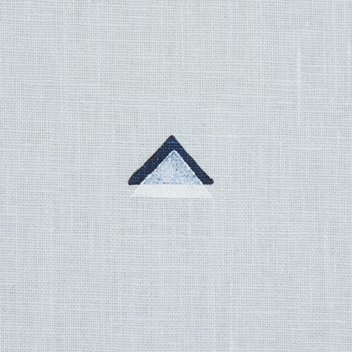 OVERLAPPING-TRIANGLES-HAND-PRINT-NAVY-AND-WHITE-ON-SKY-SCHUMACHER-74022 - Schumacher Fabric