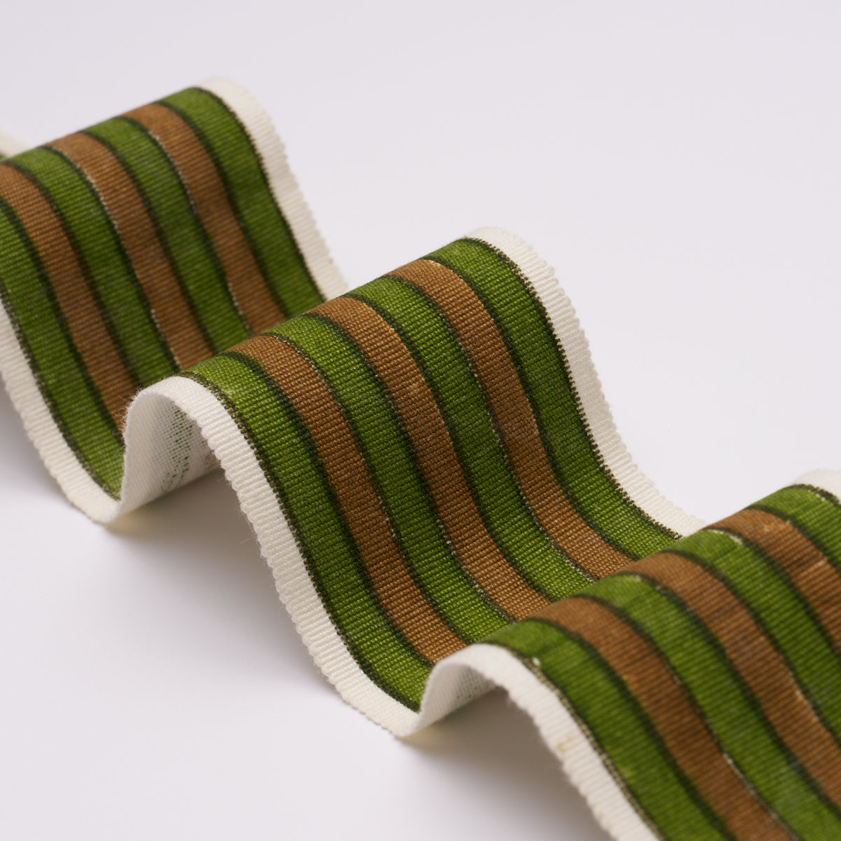 ARYA-STRIPE-HAND-BLOCK-TRIM-GREEN-SCHUMACHER-85432 - Schumacher Trim