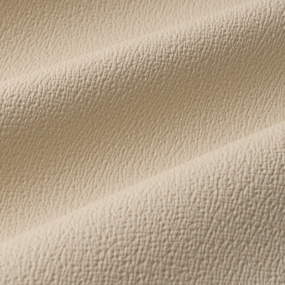 TEXTURED-VEGAN-LEATHER-CREAM-SCHUMACHER-87301 - Schumacher Fabric