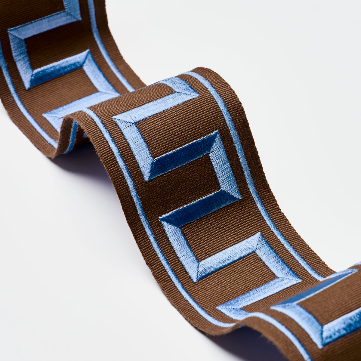 GREEK-KEY-EMBROIDERED-TAPE-BLUE-ON-BROWN-SCHUMACHER-70807 - Schumacher Trim