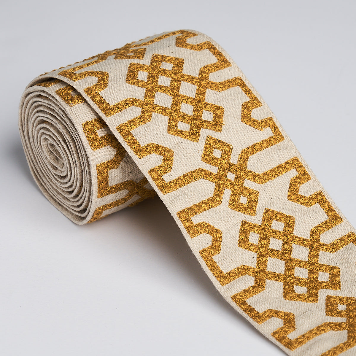 KNOTTED-TRELLIS-TAPE-OCHER-ON-UNBLEACHED-SCHUMACHER-80882 - Schumacher Trim