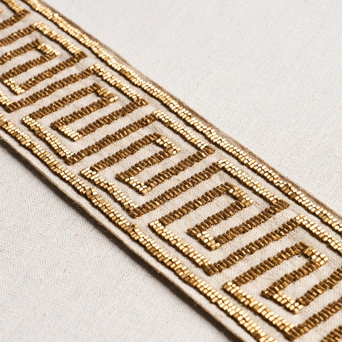 DELPHI-BEADED-TAPE-GOLD-ON-NATURAL-SCHUMACHER-83641 - Schumacher Trim